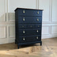 Stag minstrel black chest of drawers vintage tallboy with exposed wood top