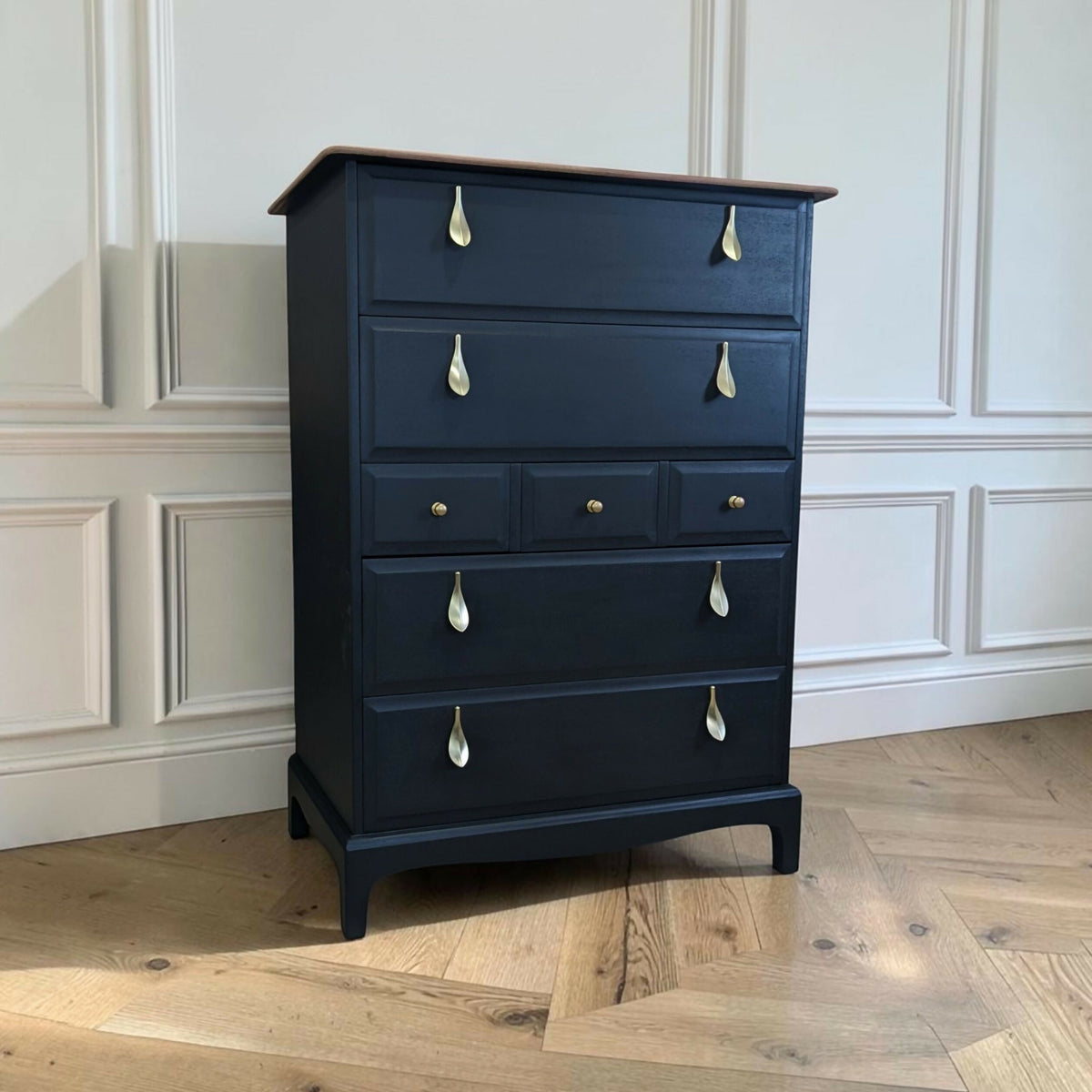 Stag minstrel black chest of drawers vintage tallboy with exposed wood top