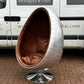 Aviation Swivel Egg Chair With Tan Leather.
