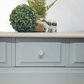 Stag Minstrel Chest of Drawers on Grey, Oversize bedside table