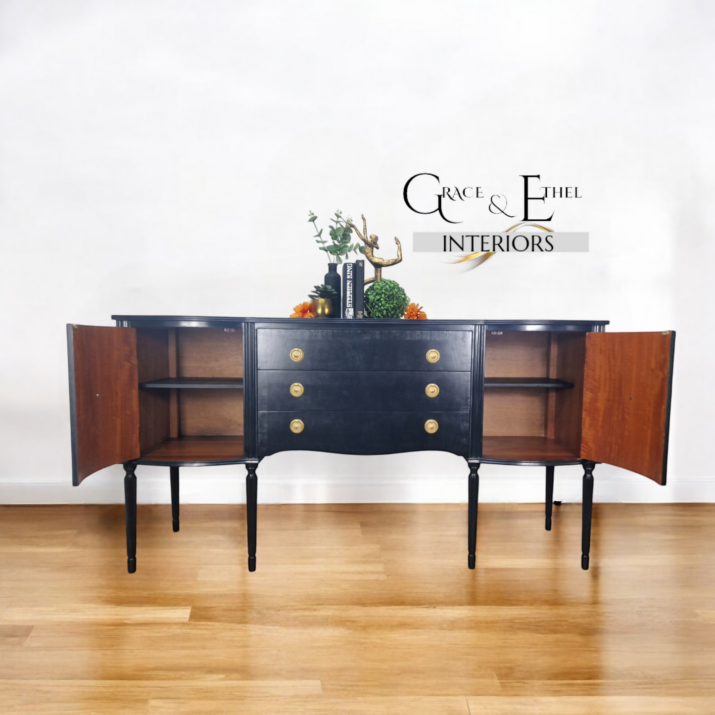 Black serpentine sideboard