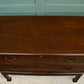 Mahogany Chest of Drawers on Raised Supports with Fretwork Decoration