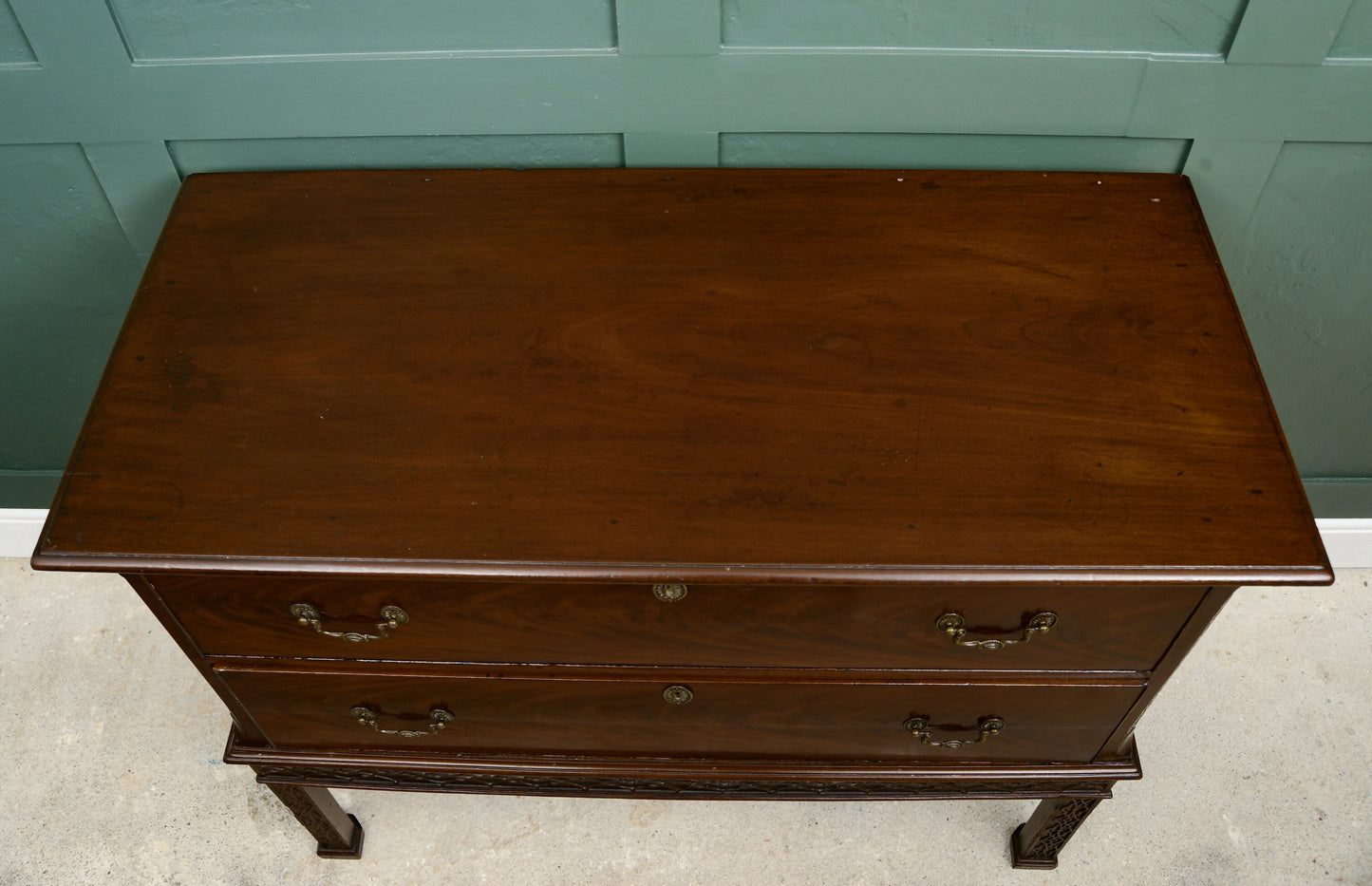 Mahogany Chest of Drawers on Raised Supports with Fretwork Decoration