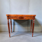 A Mahogany Serpentine Fronted Turn Over Top Tea Table