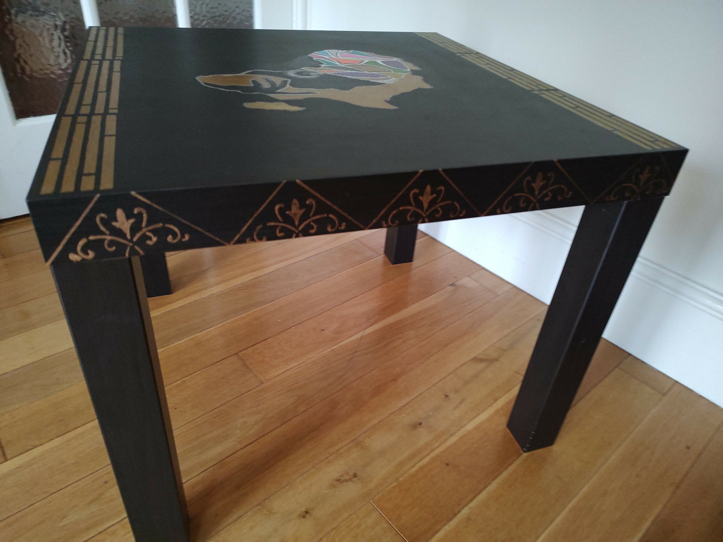 Black table with stunning African woman/map feature -Giving furniture a second life with soul