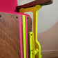Neon pink cinema seat-angle close up-seat up-Orange Otter