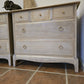 Pair Stag minstrel chest of drawers