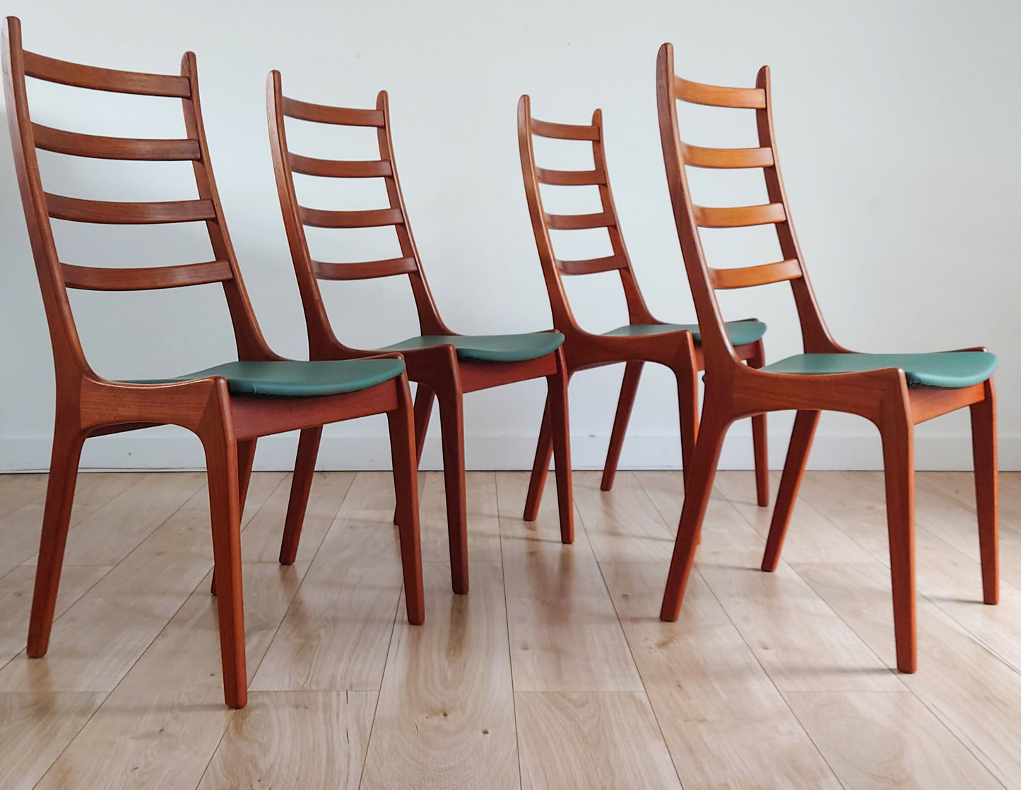 Mid century leather Danish dining chairs by Kai Kristiansen set of 4