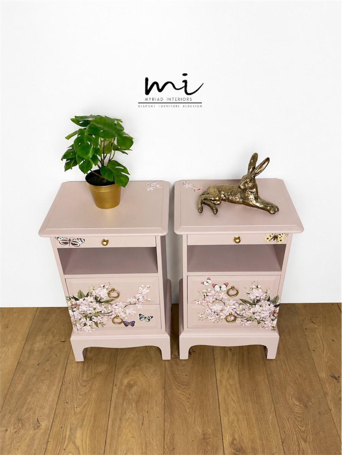 Dusky blush pink Stag Minstrel slim tea tray bedside tables with blossom and butterfly design. Nightstands pale pink