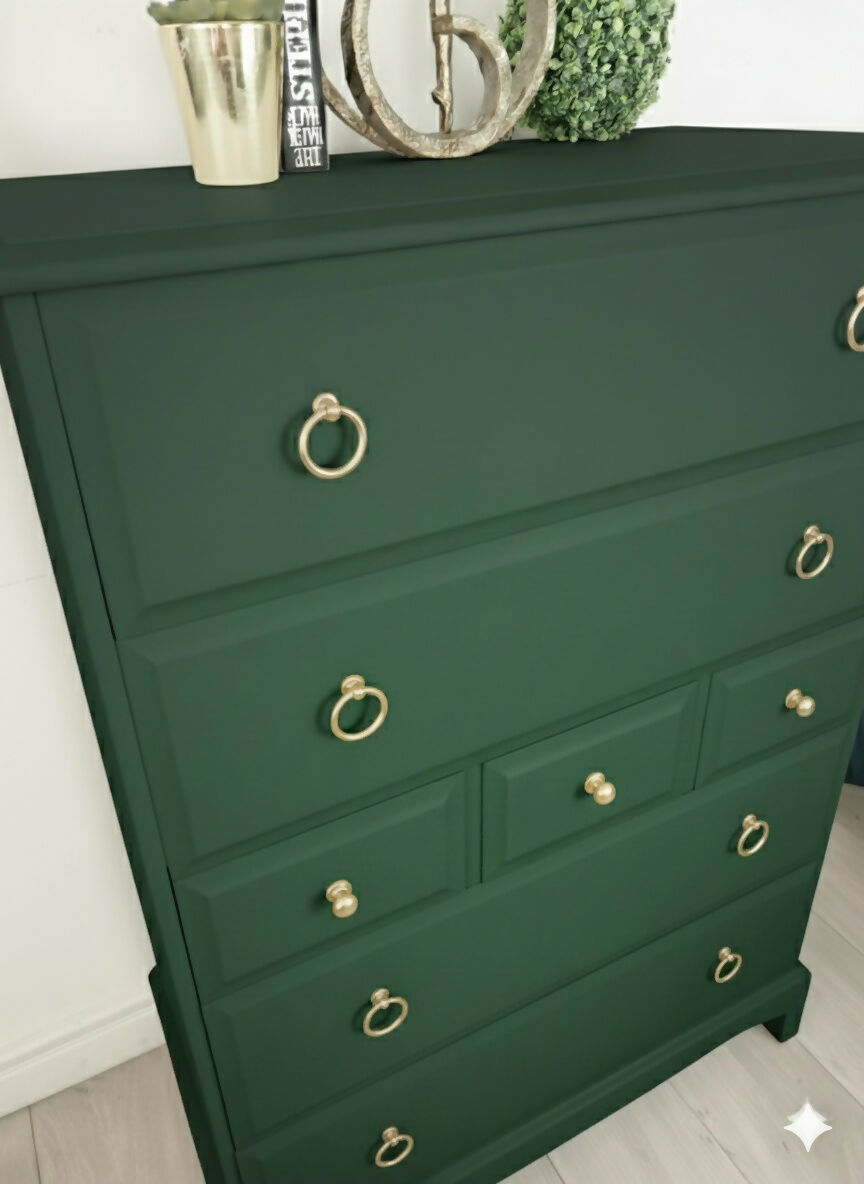Stag minstrel tallboy chest of drawers in dark green
