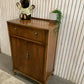 Vintage Art Deco burr walnut veneer cupboard featuring two doors and one drawer.