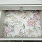 Stag Minstrel beside cabinet with 2 drawers & pullout tray painted in clotted cream