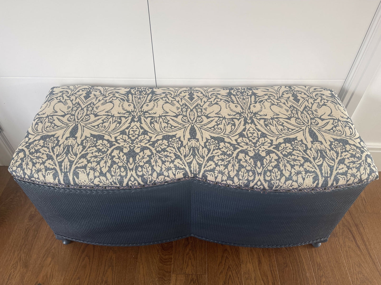 Mid century Ottoman. Repainted and reupholstered in Brer Rabbit material fabric dark blue