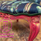 Bold statement accent chair. Pinks,blues and golds