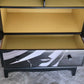 Stag Linen Press | Jet Black Gloss Cabinet with Striking Femme Artwork & Dramatic Yellow Interior