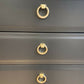 Stag four drawer black bedside cabinets, pair,