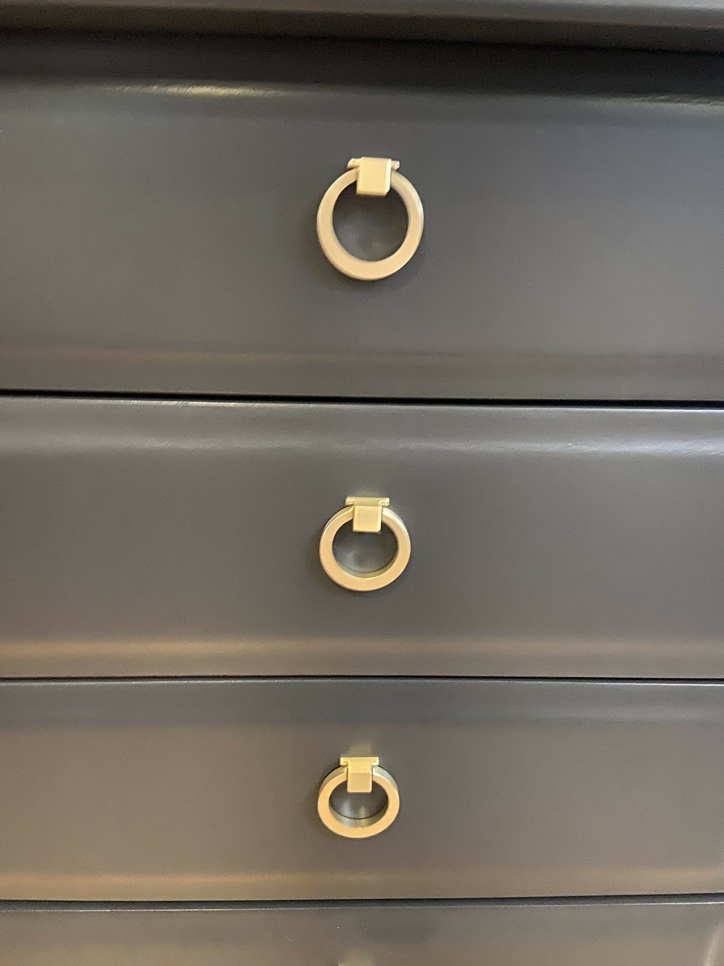 Stag four drawer black bedside cabinets, pair,