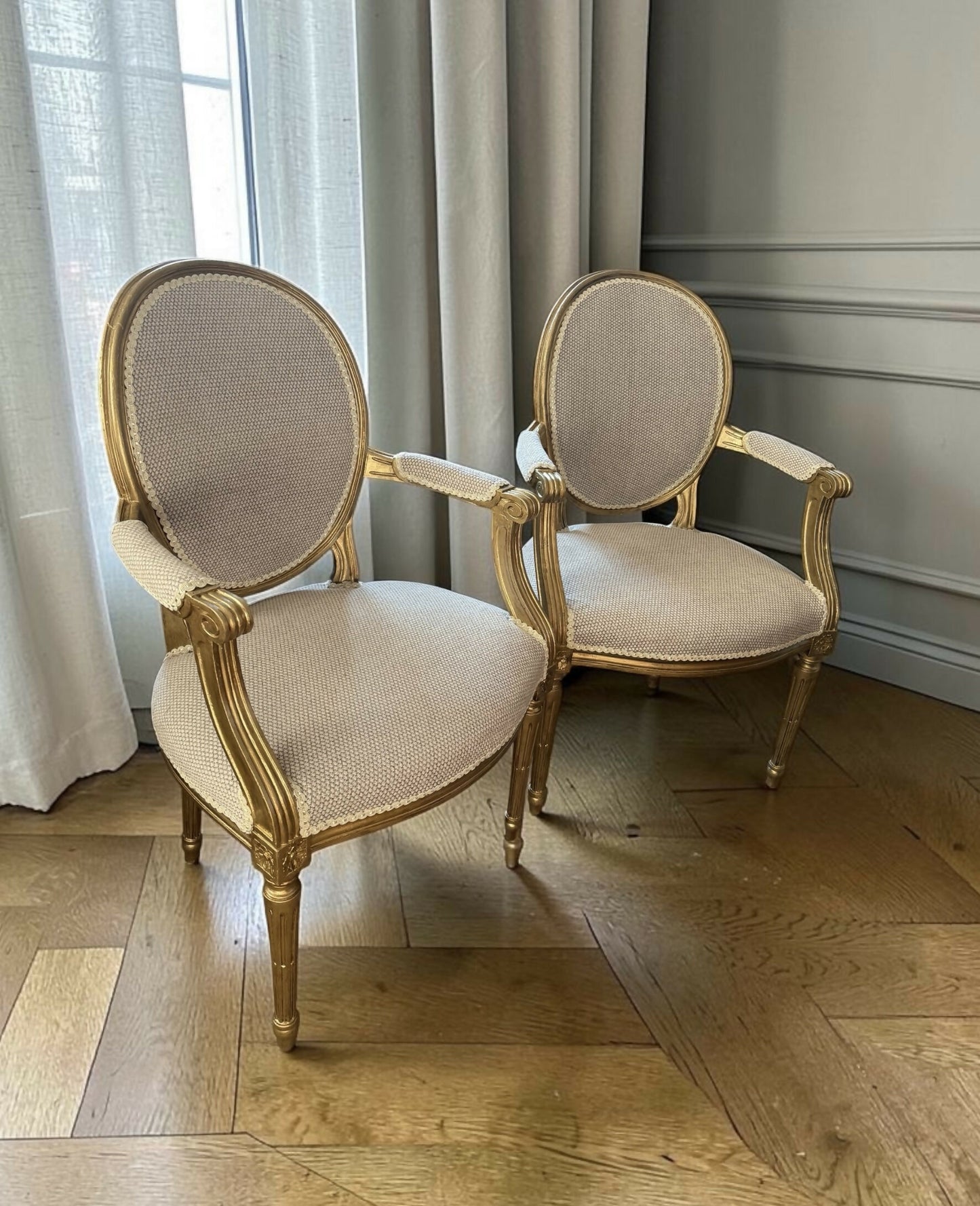 Stunning pair of freshly upholstered Louis XVI antique armchairs