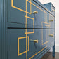 Blue and gold chest of drawers with geometric pattern and original mirrors