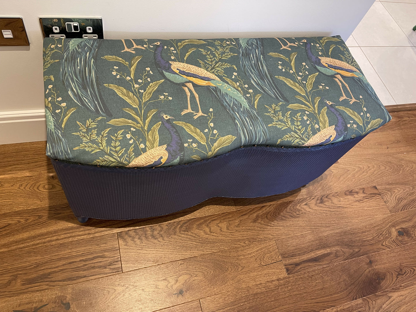Peacock themed ottoman. Mid century refurbished