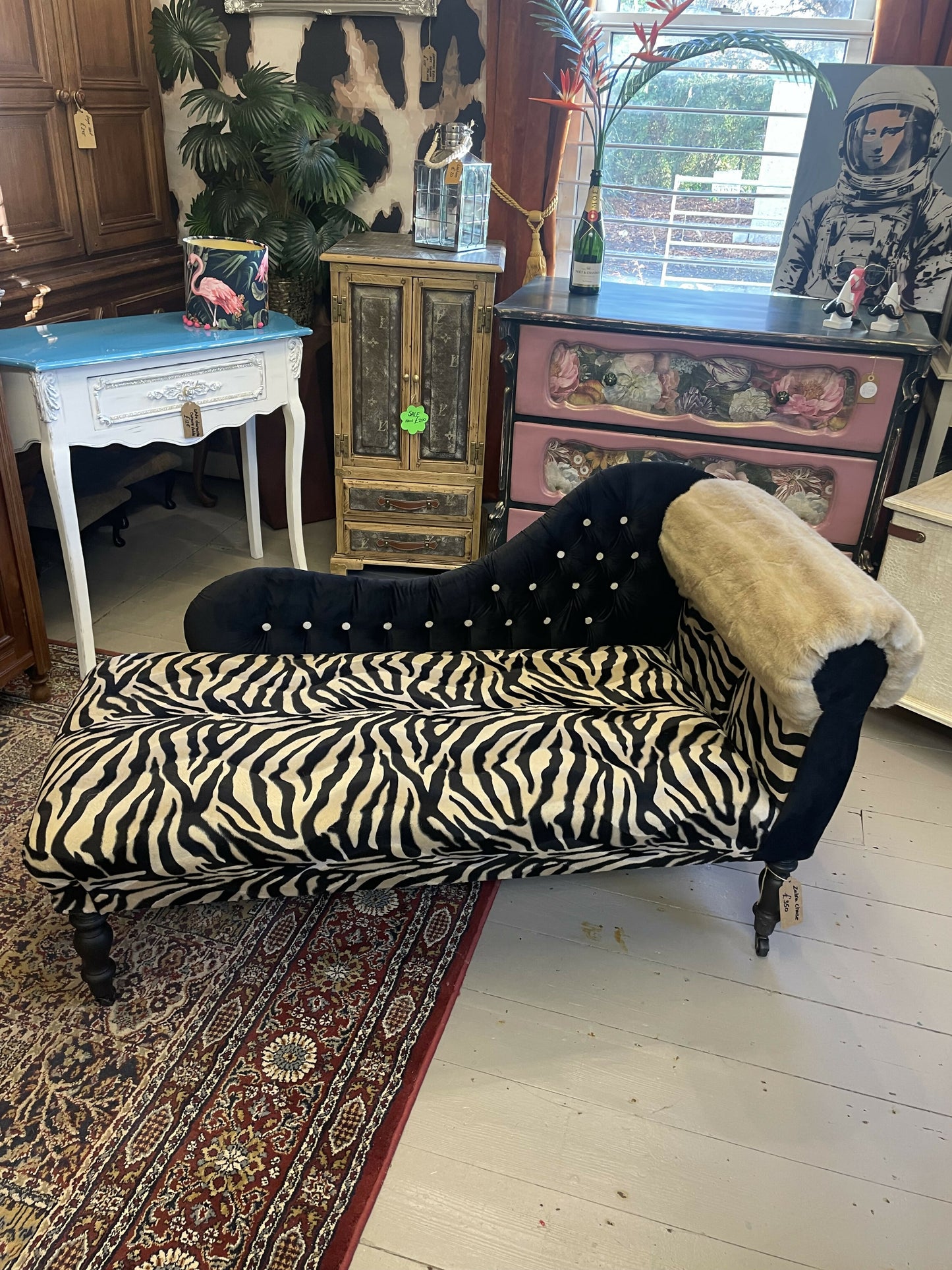 Baby chaise lounge in velvet zebra print and faux mink fur roll top
