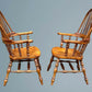 A Large Pair of Ash Broad Arm Windsor Chairs