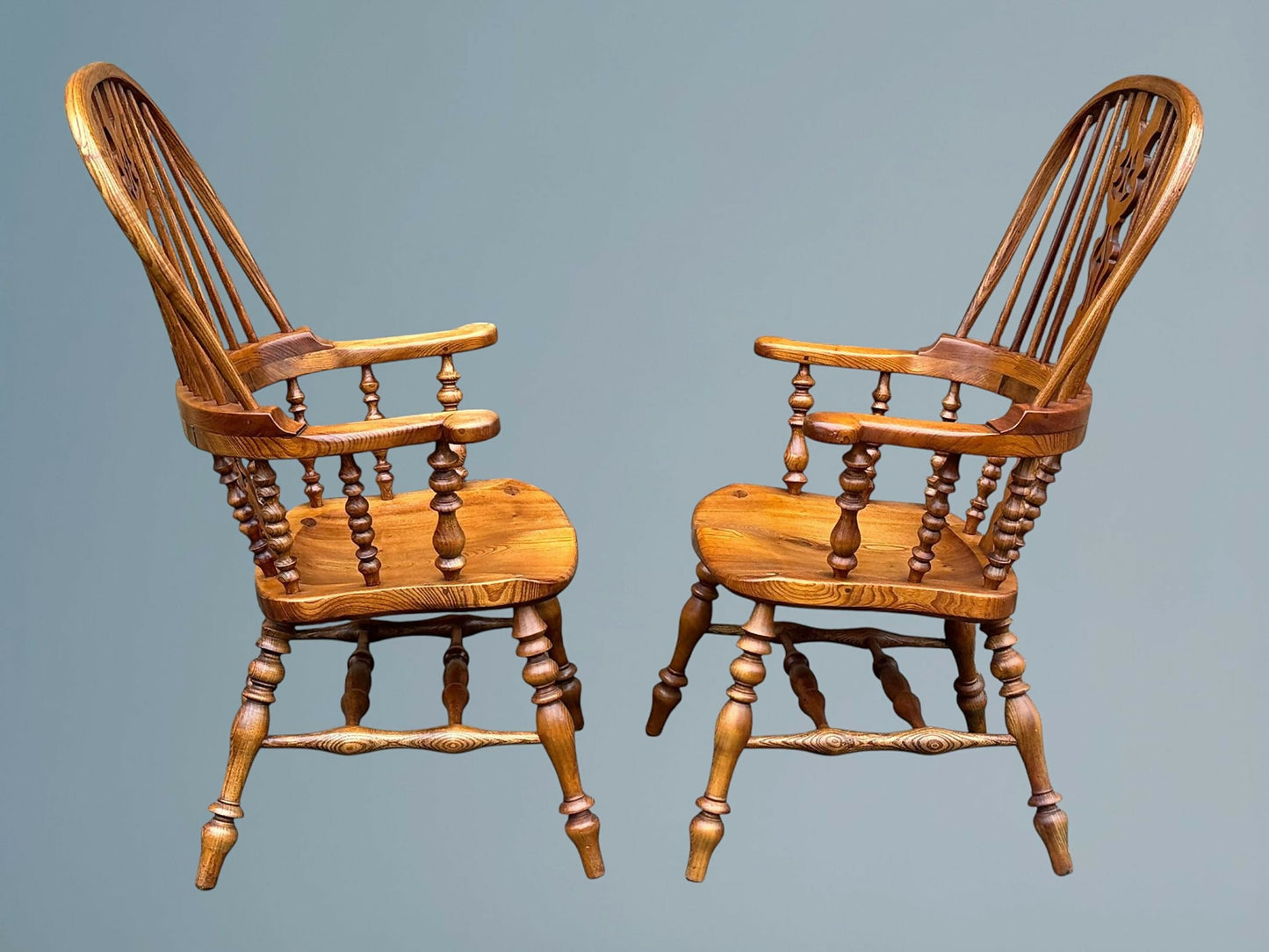 A Large Pair of Ash Broad Arm Windsor Chairs