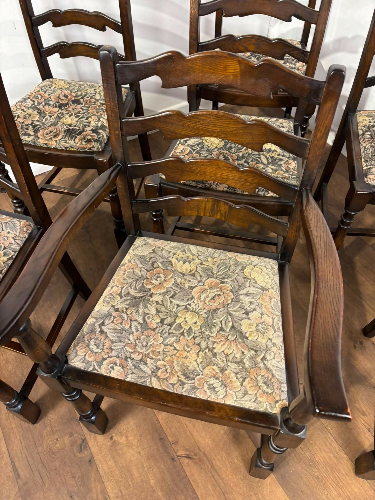 Vintage Set of Seven Oak Ladder Back Dining Chairs Including Carver Chair