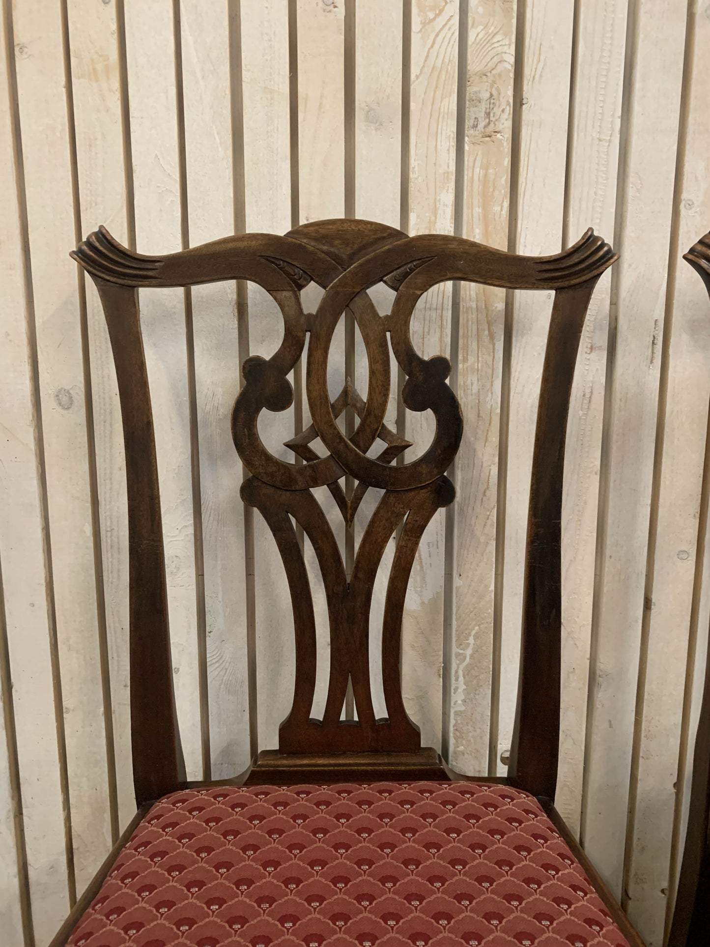 6 Mahogany Chippendale Style Dining Chairs with Red Upholstered drop-in seats.