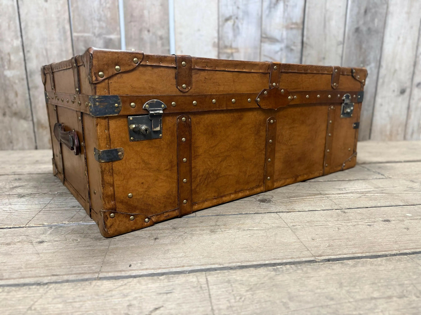 luxury tan leather coffee table trunk.