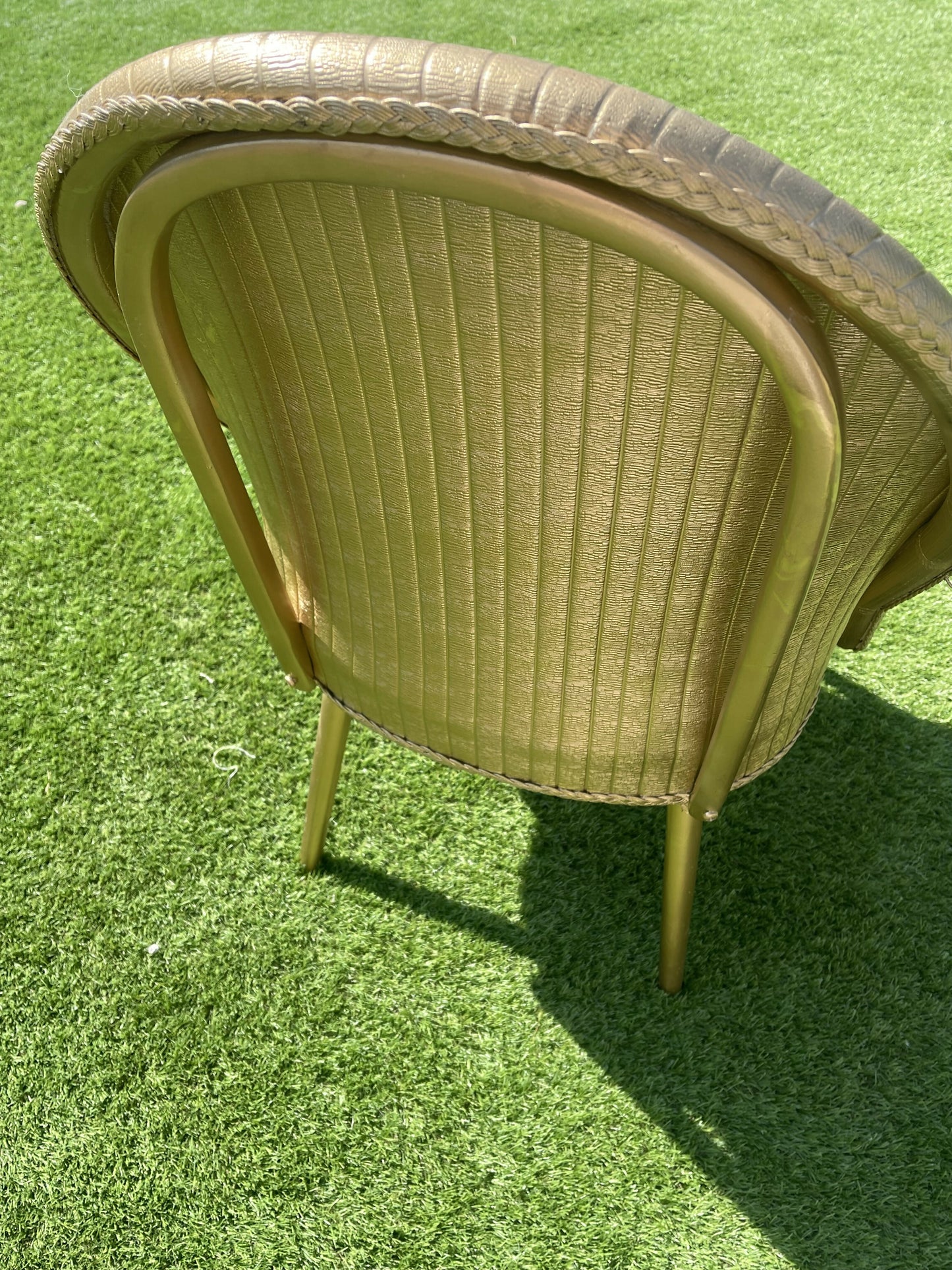 Gold wipe clean accent chair with luxurious white boucle fabric and some sneaky storage