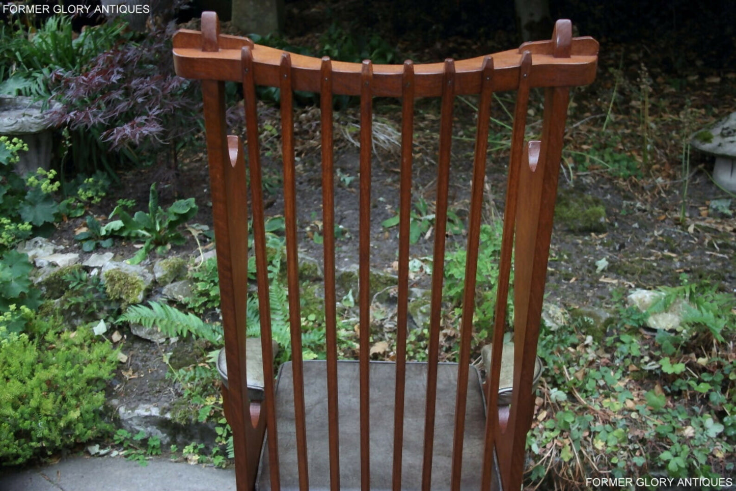 A RUPERT / NIGEL GRIFFITHS CARVED OAK DERBYSHIRE WING BACK LEATHER / ARMCHAIR