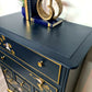 Nay and gold stag minstrel tall boy chest of drawers