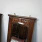 A Pair of Victorian Wall Mirrors Bevel Edged Glass Carved Top and Bottom