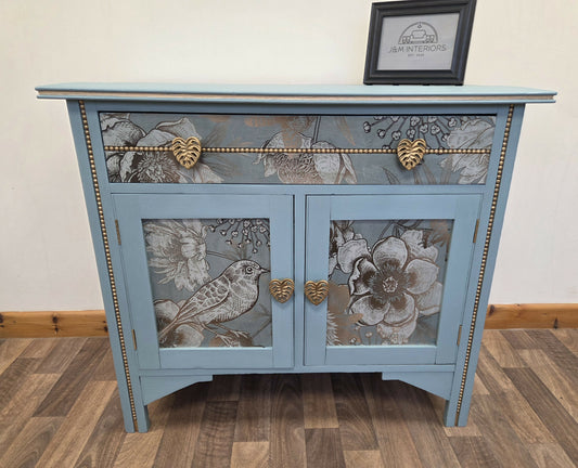Vintage pale blue and gold drawered cupboard.