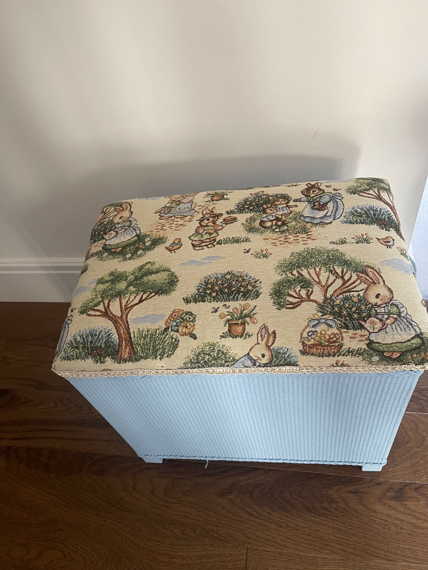 Bijou ottoman seat sky blue with Peter Rabbit themed upholstery. 45cm high 45cm long 30cm deep