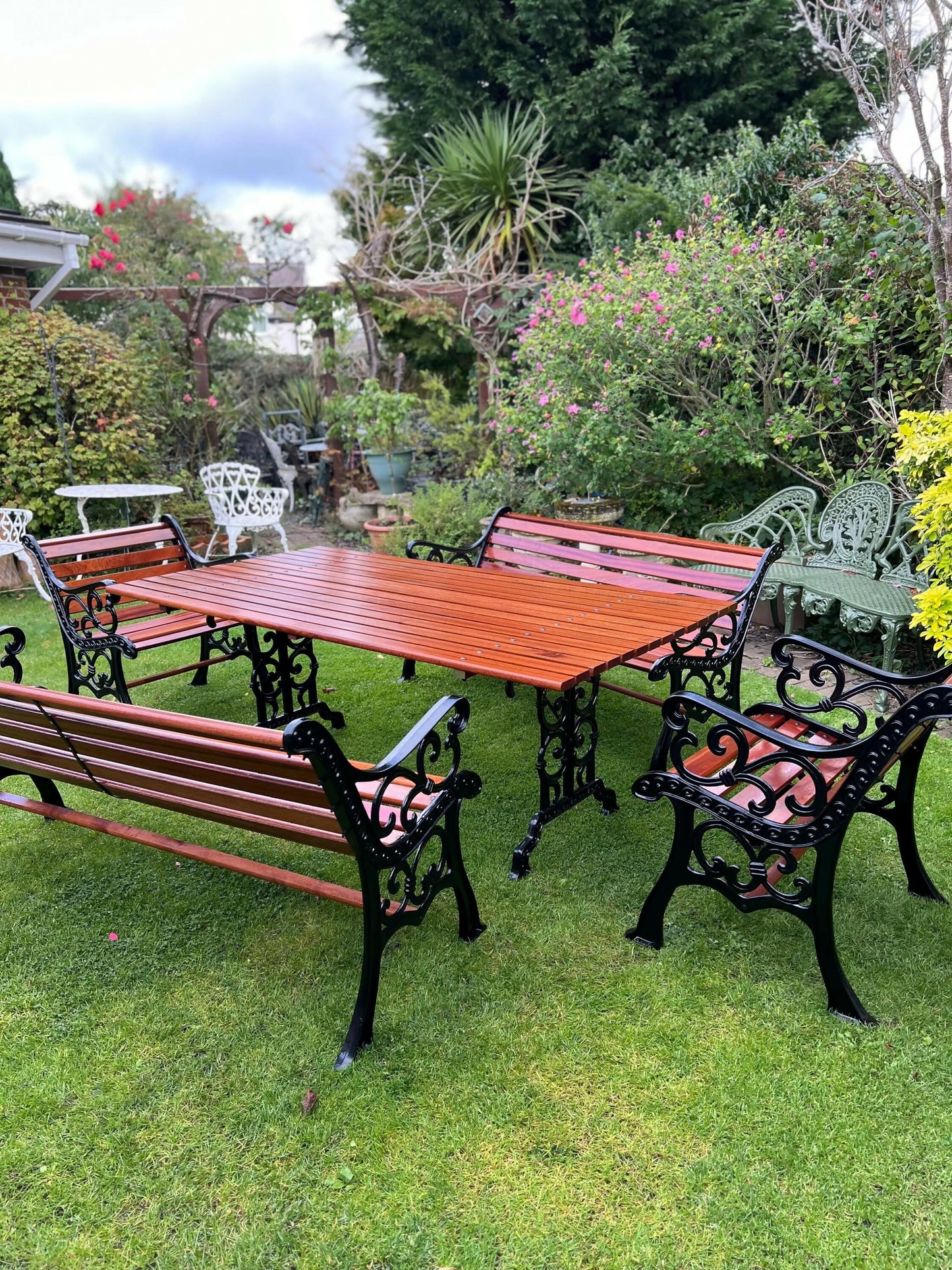 Black Vintage Cast Iron Patio Set adorned with Sapele Wood 3 seater Benches included