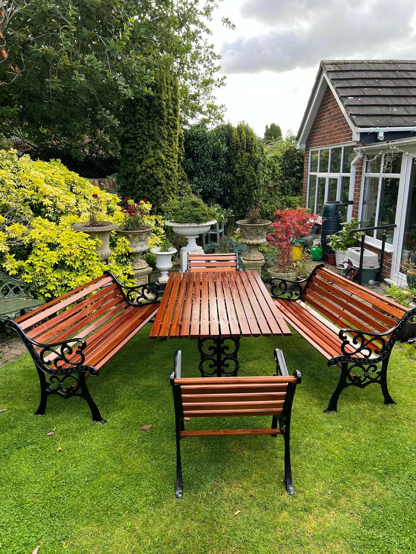 Black Vintage Cast Iron Patio Set adorned with Sapele Wood 3 seater Benches included
