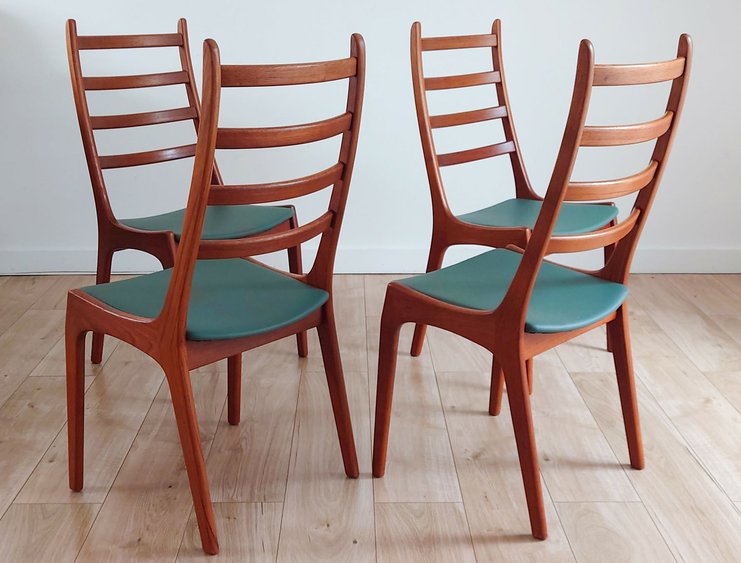 Mid century leather Danish dining chairs by Kai Kristiansen set of 4
