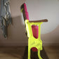 Neon pink cinema seat-side view-seat up-Orange Otter