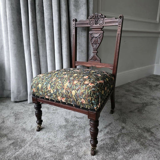Antique, Mahogany framed Child's Chair on Original Castors. Covered in Wlm Morris Fabric.