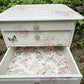 Stag Minstrel beside cabinet with 2 drawers & pullout tray painted in clotted cream