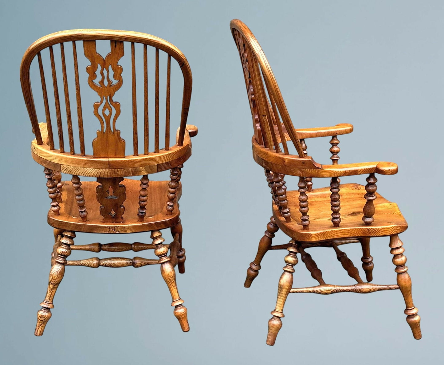 A Large Pair of Ash Broad Arm Windsor Chairs