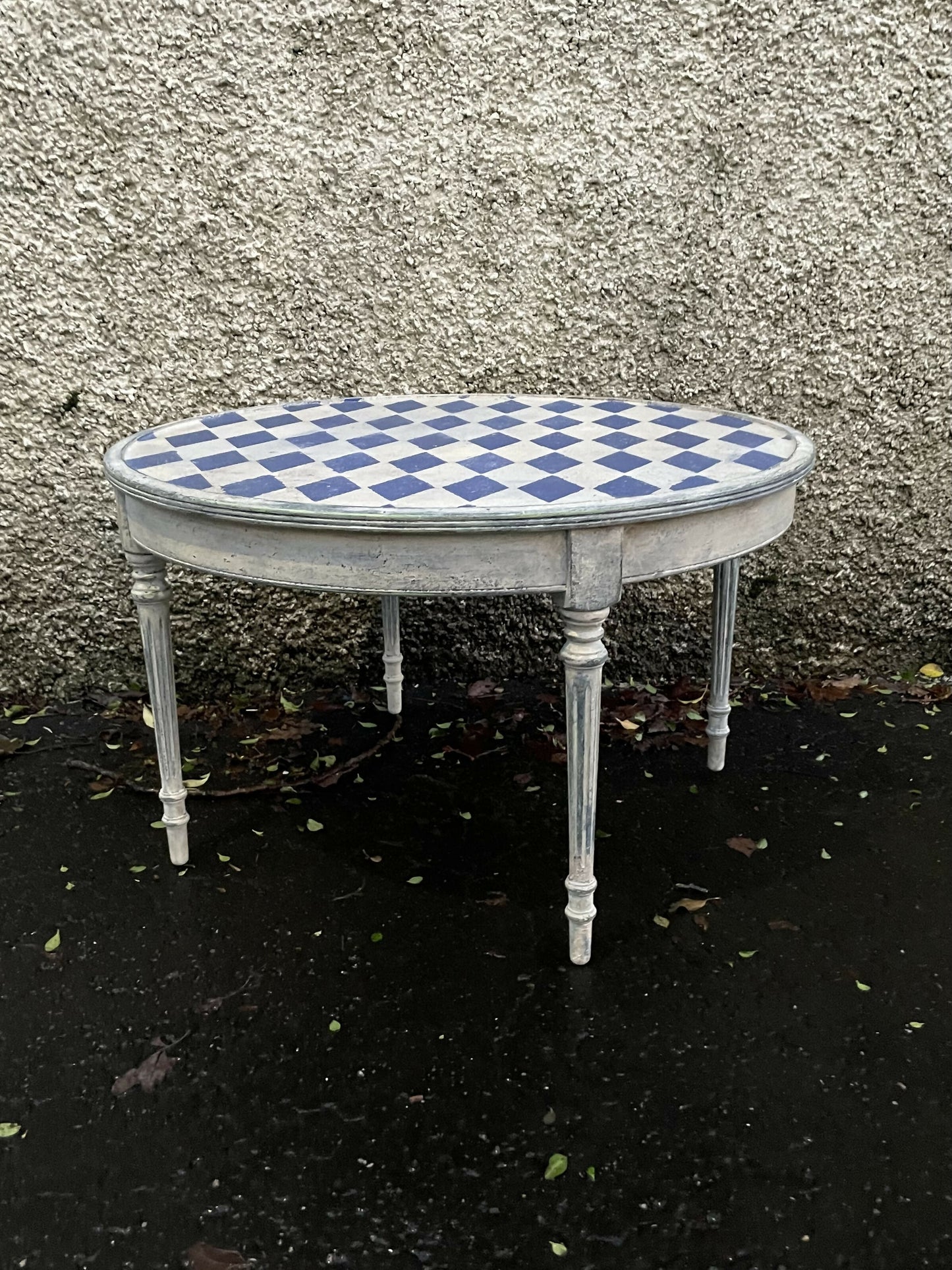 Vintage coffee table painted in a textured patina with french diamond stencil design.