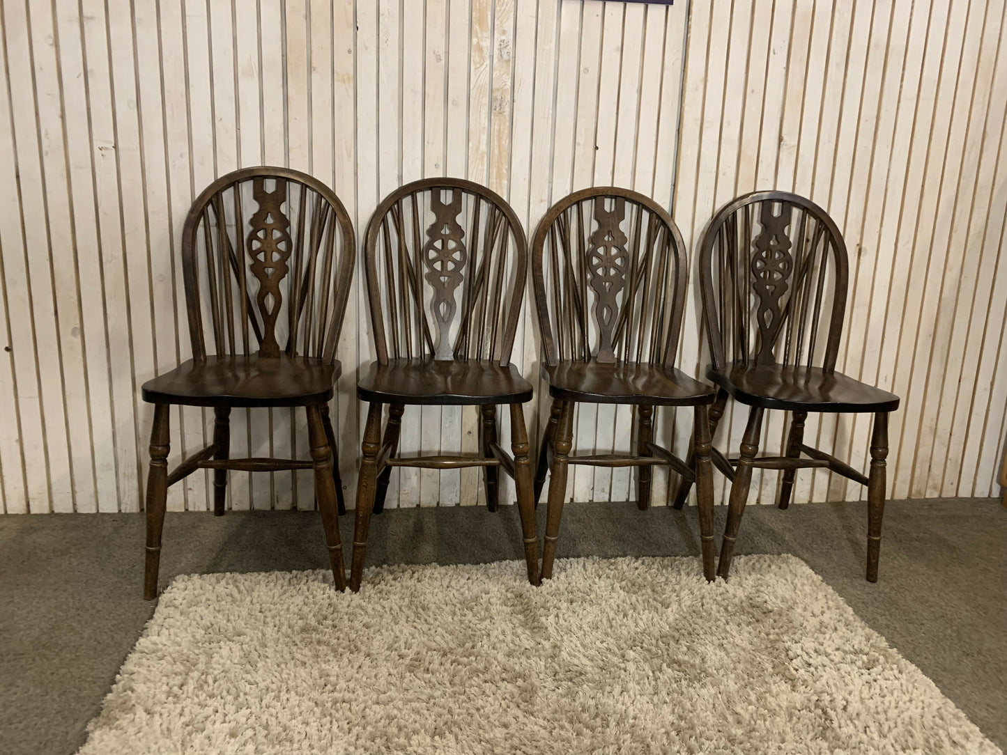Set of 4 Vintage Wheel Back Dining Chairs – Solid Wood – Carved Backrest