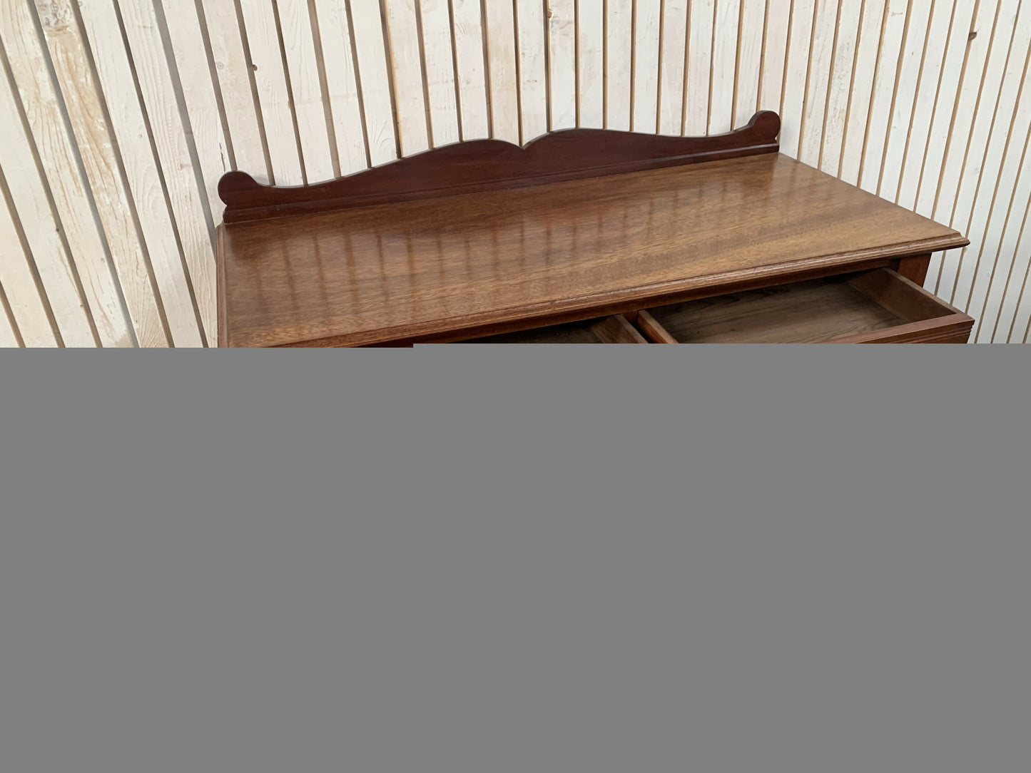 A Victorian Mahogany Writing Table/Desk With Drawer on castors.