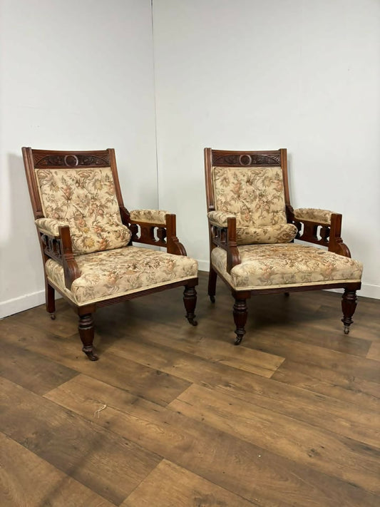 Pair of Victorian Carved Walnut Upholstered Library Armchairs