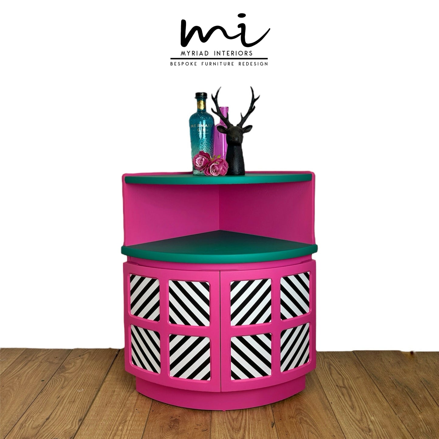 Maximalist hot pink and turquoise Nathan corner cabinet with black and white geometric design, mid century modern, bold, bright, statement