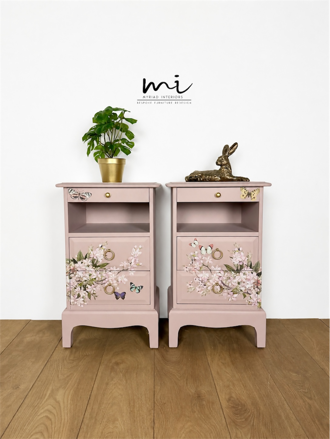 Dusky blush pink Stag Minstrel slim tea tray bedside tables with blossom and butterfly design. Nightstands pale pink