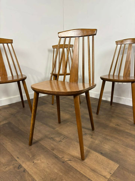 Set of Four Rodanski Mid Century Danish Style Stick-Back Dining Chairs